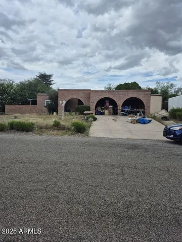 a view of car parked in front of house
