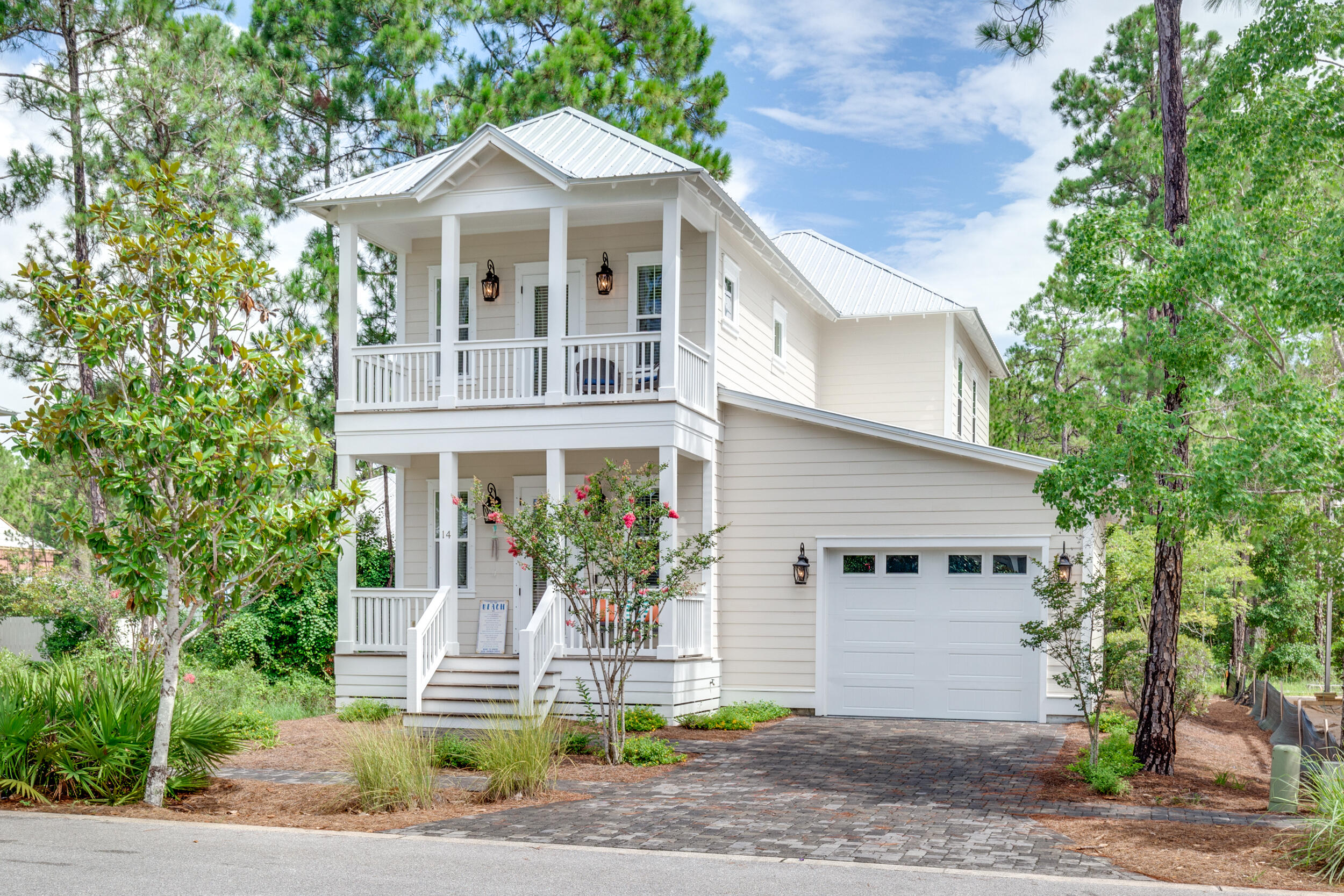 14 Crepe Myrtle Lane Santa Rosa Beach, FL 32459 - Photo 1 of 38 a front view of a house with garden