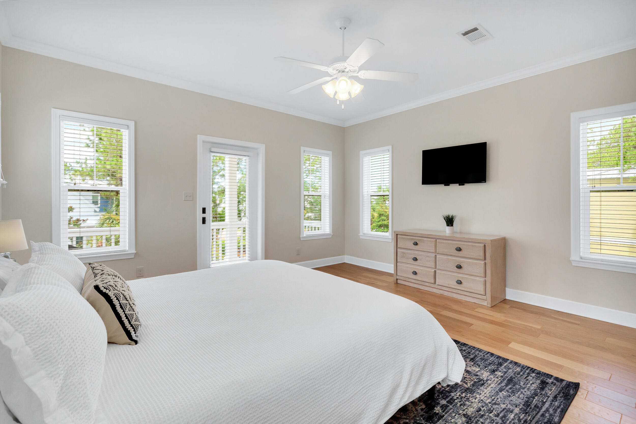 14 Crepe Myrtle Lane Santa Rosa Beach, FL 32459 - Photo 19 of 38 a spacious bedroom with a bed and a flat screen tv