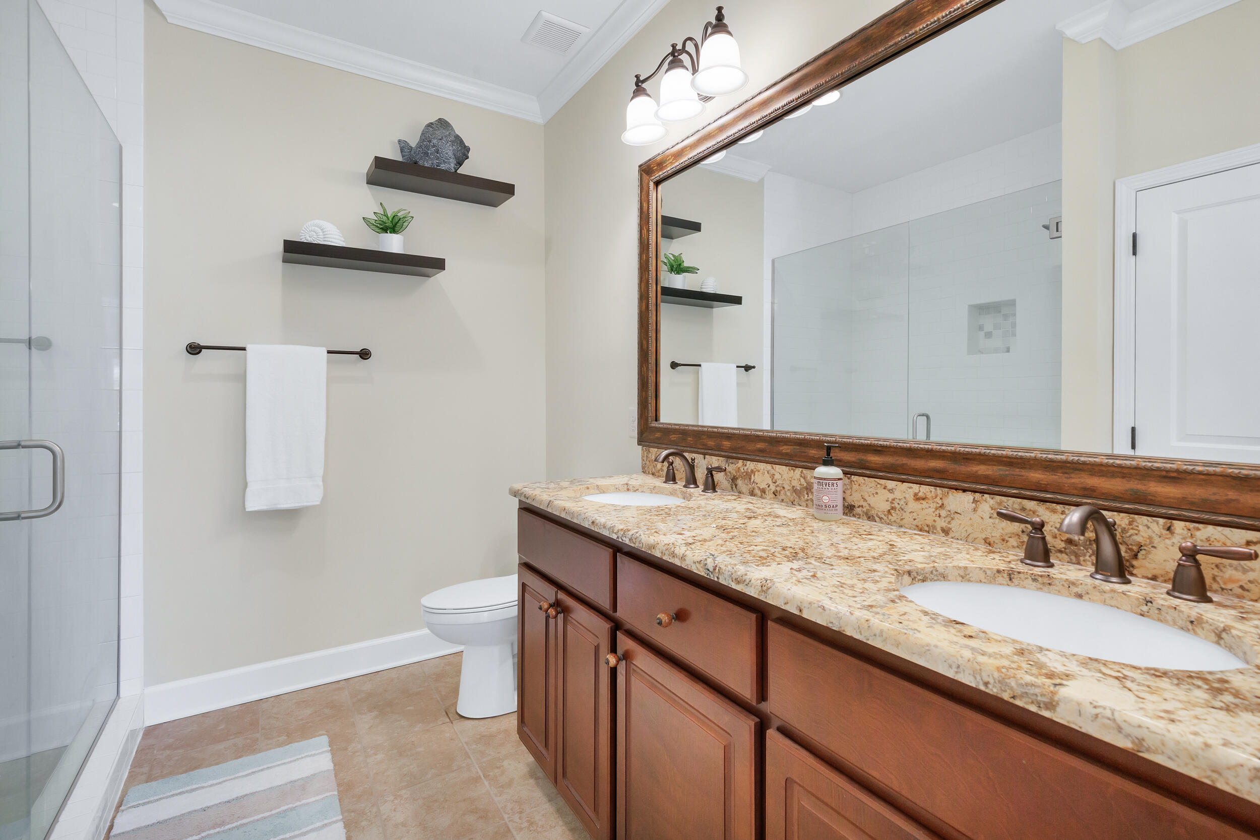 14 Crepe Myrtle Lane Santa Rosa Beach, FL 32459 - Photo 20 of 38 a bathroom with a granite countertop sink and a mirror