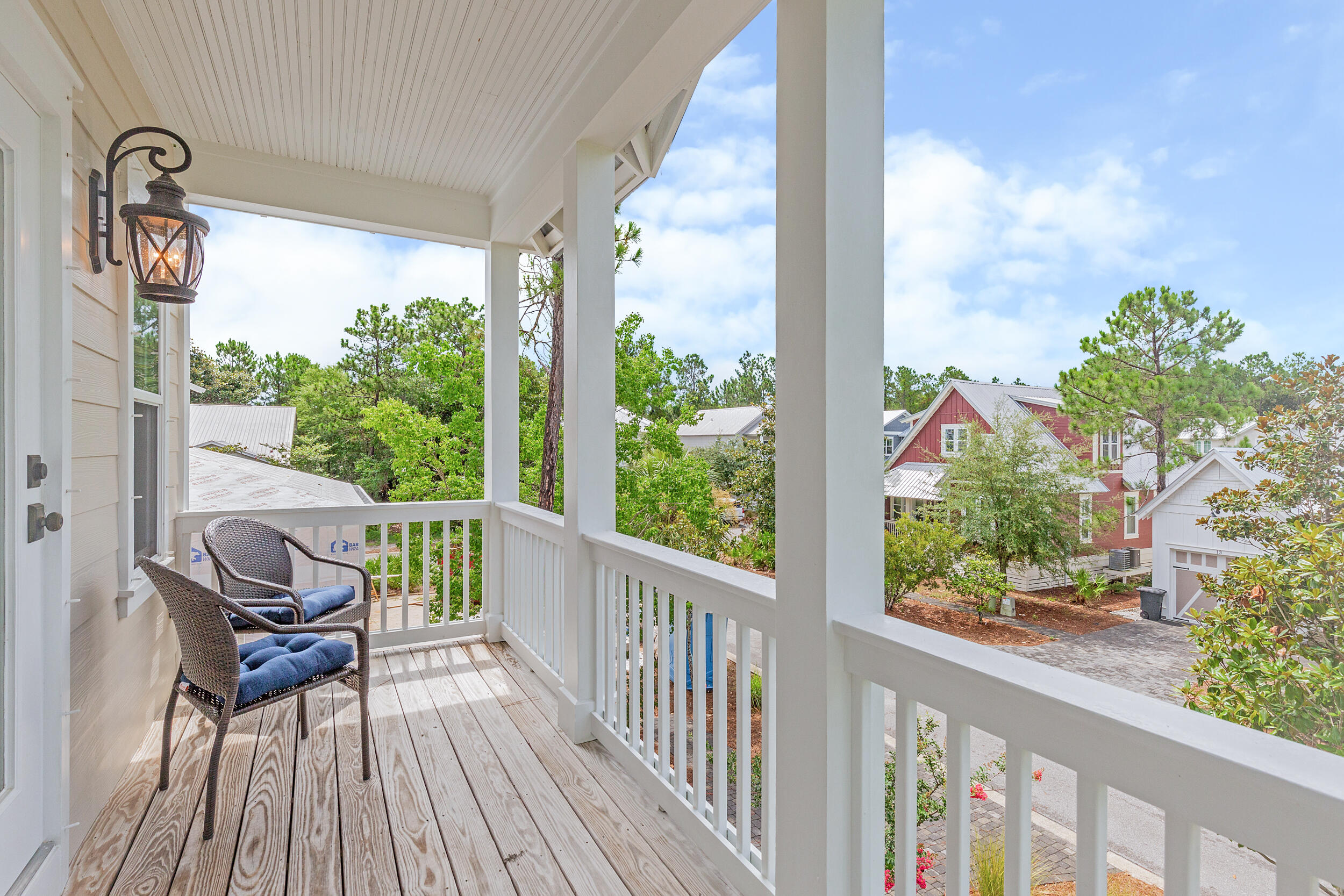 14 Crepe Myrtle Lane Santa Rosa Beach, FL 32459 - Photo 22 of 38 a view of a two chair and table in the balcony