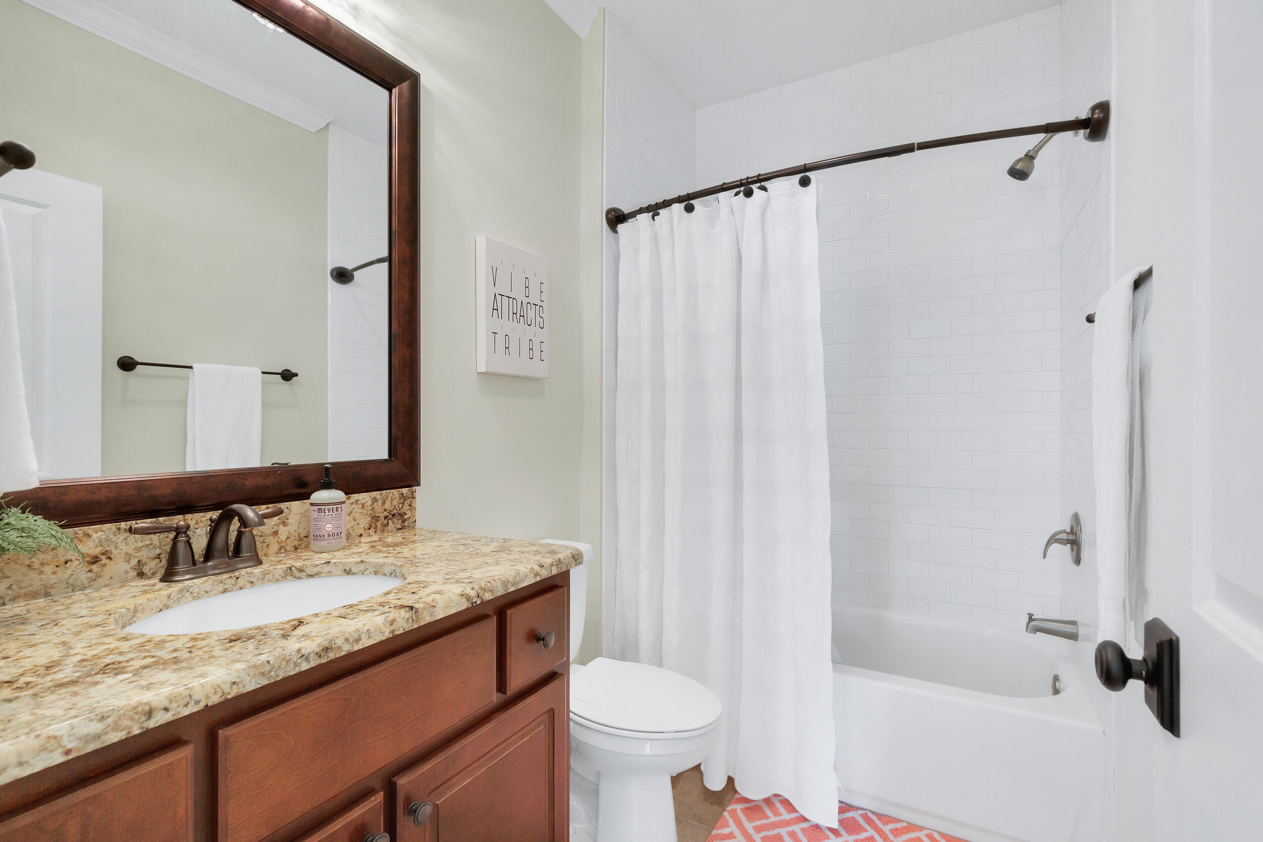 14 Crepe Myrtle Lane Santa Rosa Beach, FL 32459 - Photo 28 of 38 a bathroom with a granite countertop sink and a mirror