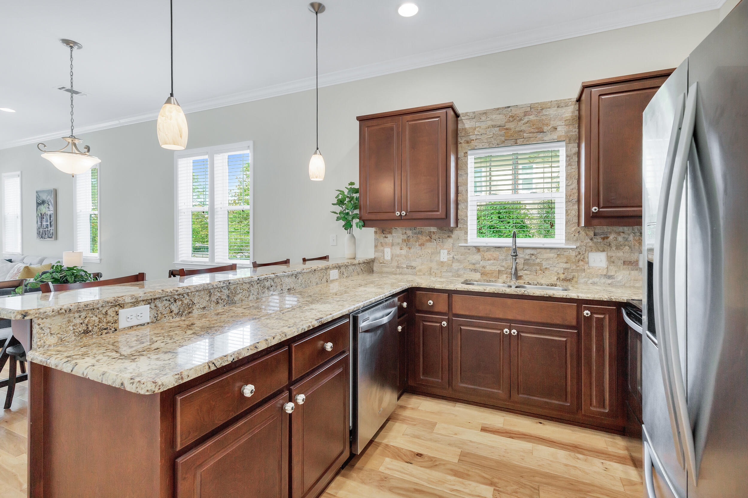 14 Crepe Myrtle Lane Santa Rosa Beach, FL 32459 - Photo 10 of 38 a kitchen with a sink center island and a window
