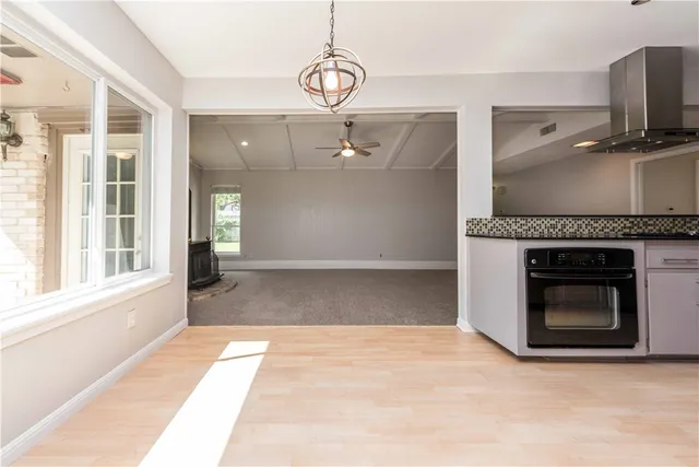 a view of a livingroom with a fireplace and furniture