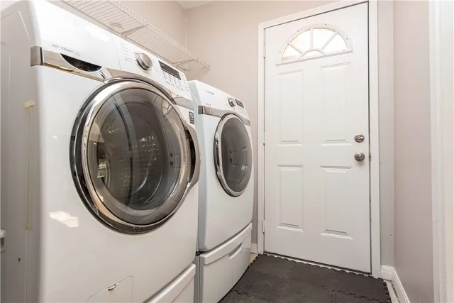 a utility room with dryer and washer