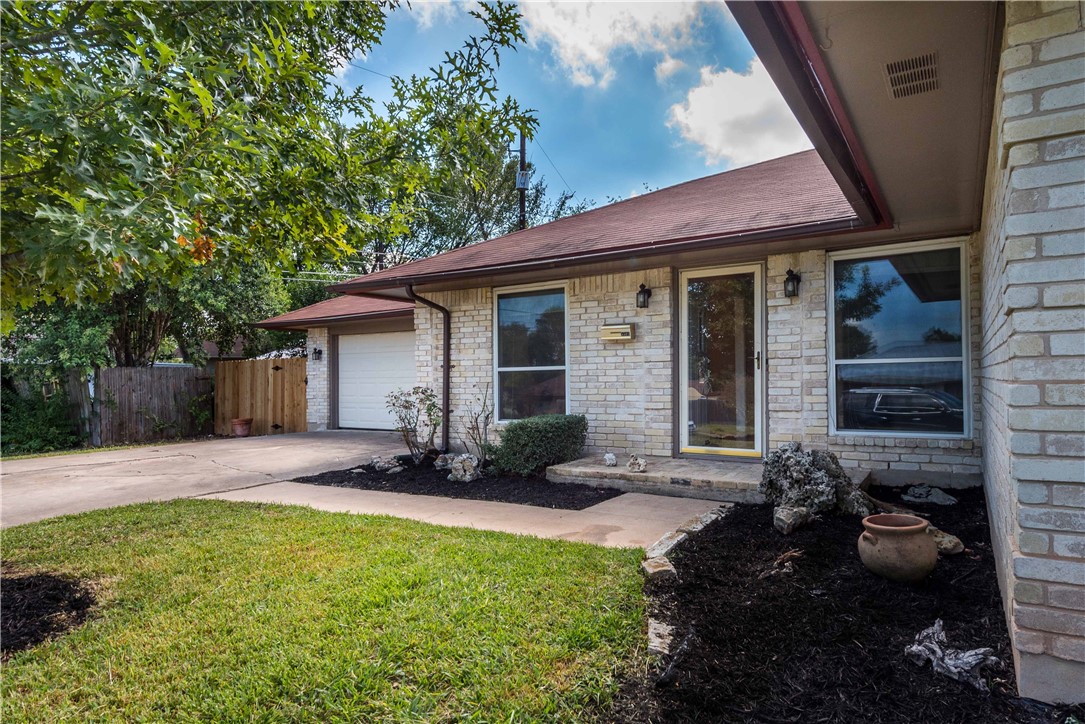 5505 Pendleton Lane Austin, TX 78723 - Photo 2 of 30 a view of a house with backyard sitting area and porch