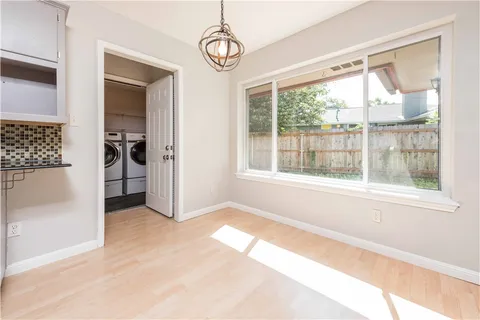 a view of livingroom with furniture chandelier