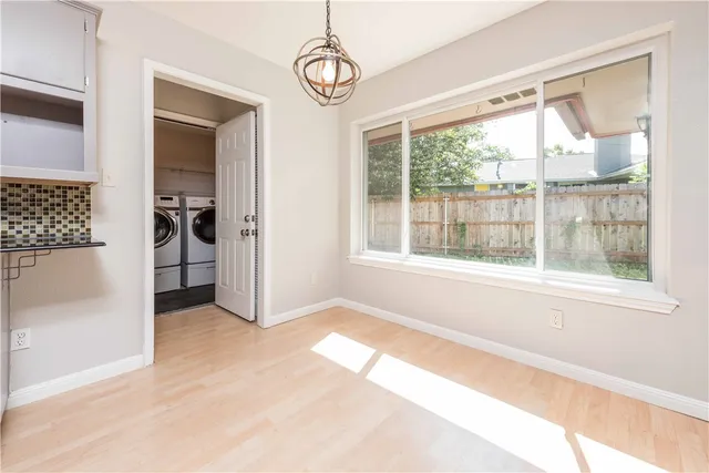 a view of livingroom with furniture chandelier