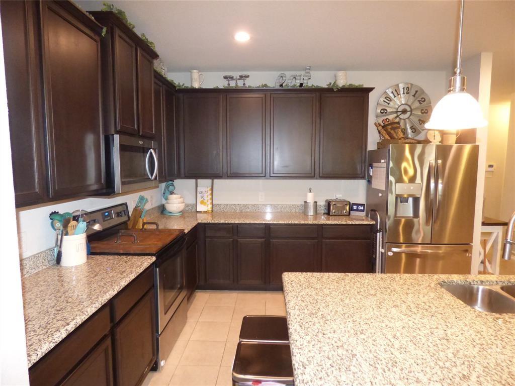 7416 Boat Wind Road Fort Worth, TX 76179 - Photo 6 of 18 Lots of prep area in this large kitchen