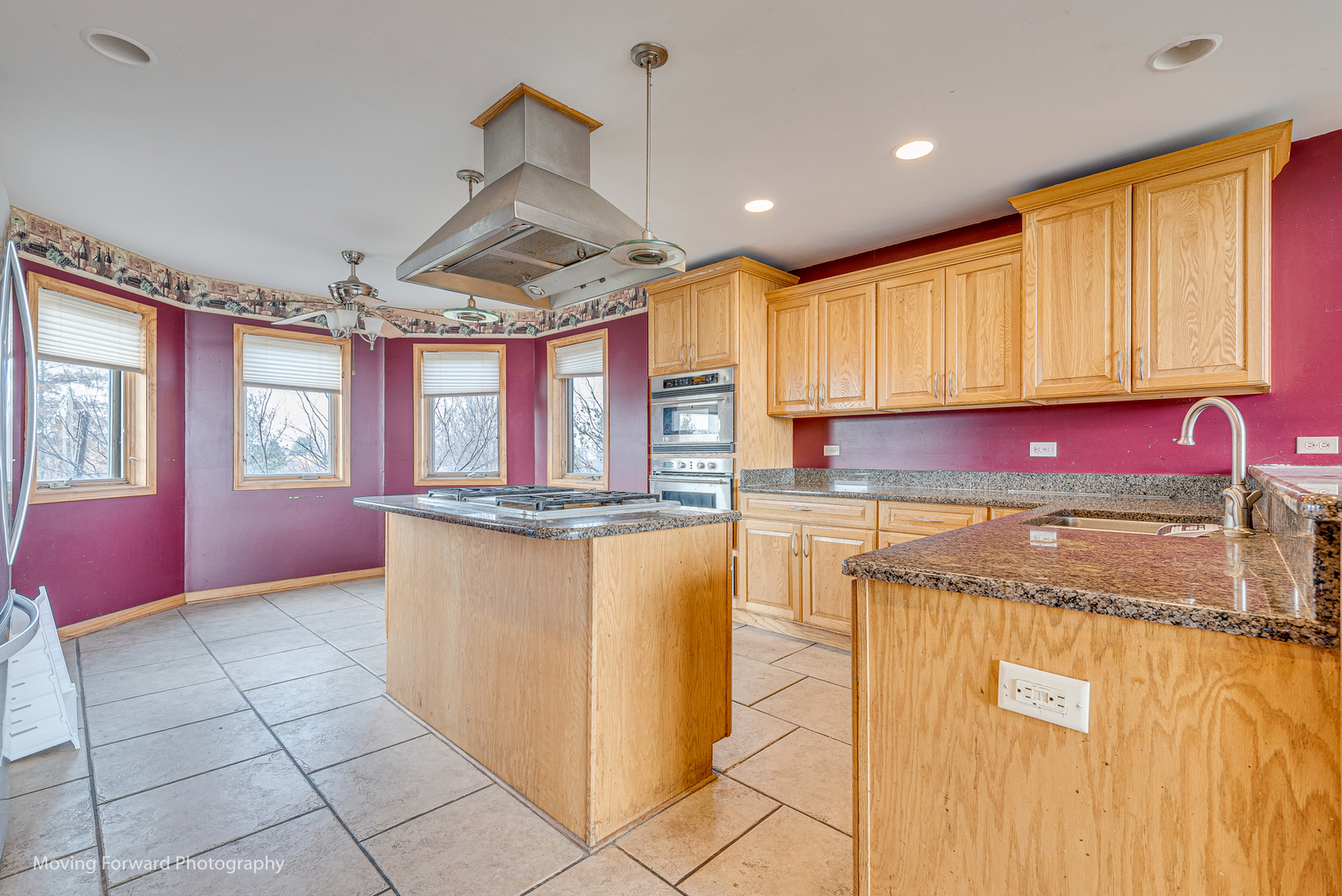 30416 South State Line Road Beecher, IL 60401 - Photo 18 of 39 a kitchen with stainless steel appliances granite countertop a stove a sink and a refrigerator