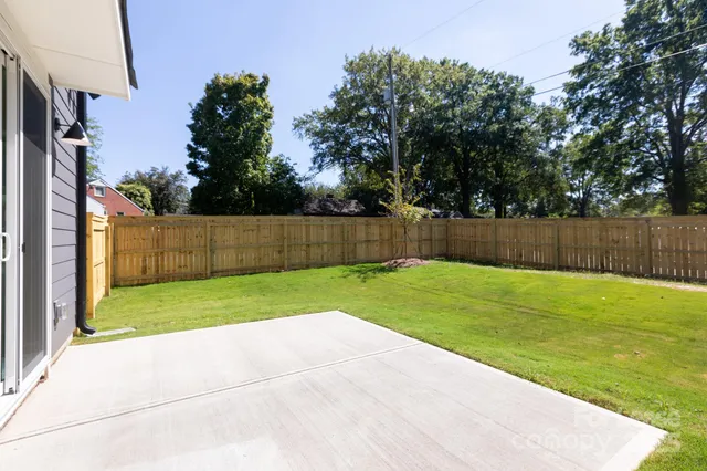 a view of backyard with green space
