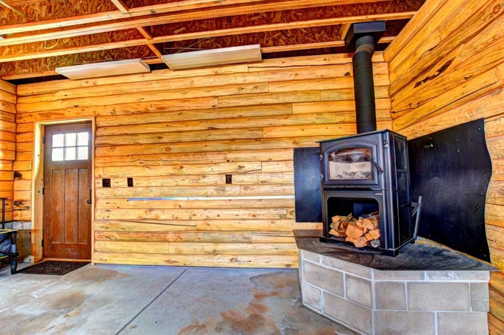 883 Osprey Road Como, CO 80432 - Photo 23 of 30 a living room with fireplace furniture and a fireplace