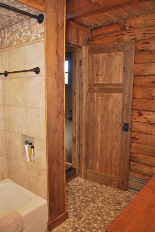 883 Osprey Road Como, CO 80432 - Photo 8 of 30 a bathroom with a shower