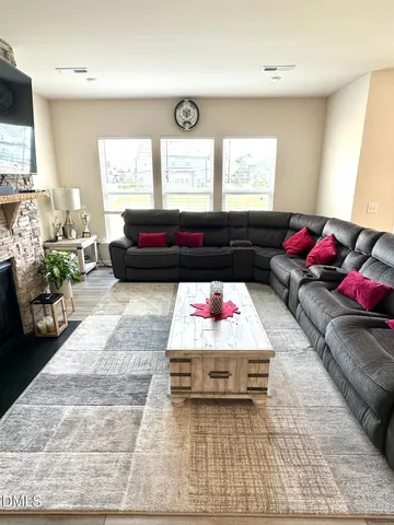 a room with furniture and a window