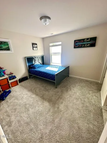 a balcony with furniture and city view