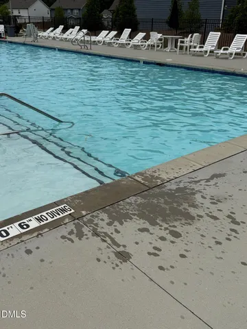 a view of a house with a swimming pool