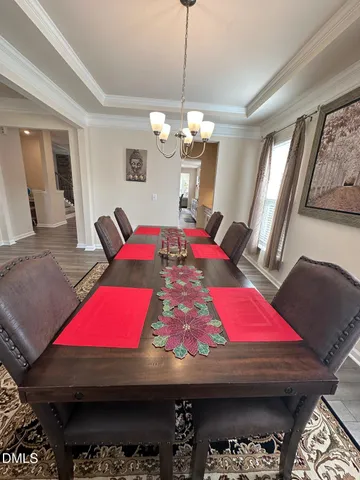 a room with furniture and wooden floor