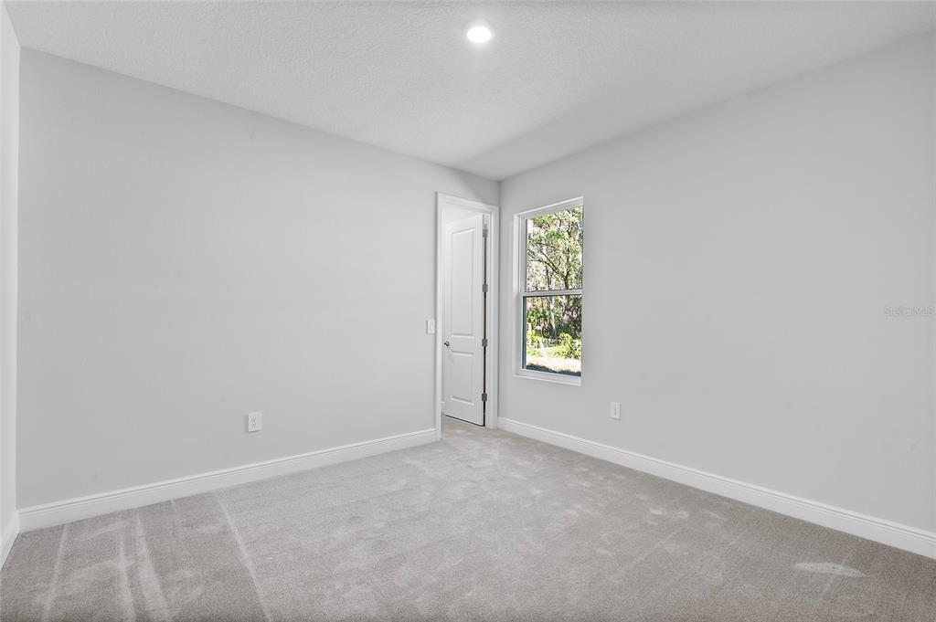 304 North Jungle Road Geneva, FL 32732 - Photo 39 of 49 an empty room with windows