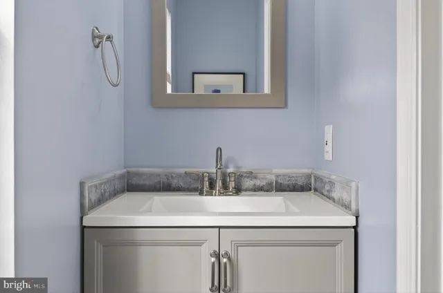 a view of a room with wooden floor and staircase