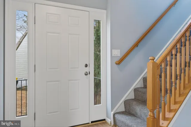 a view of a kitchen from the hallway