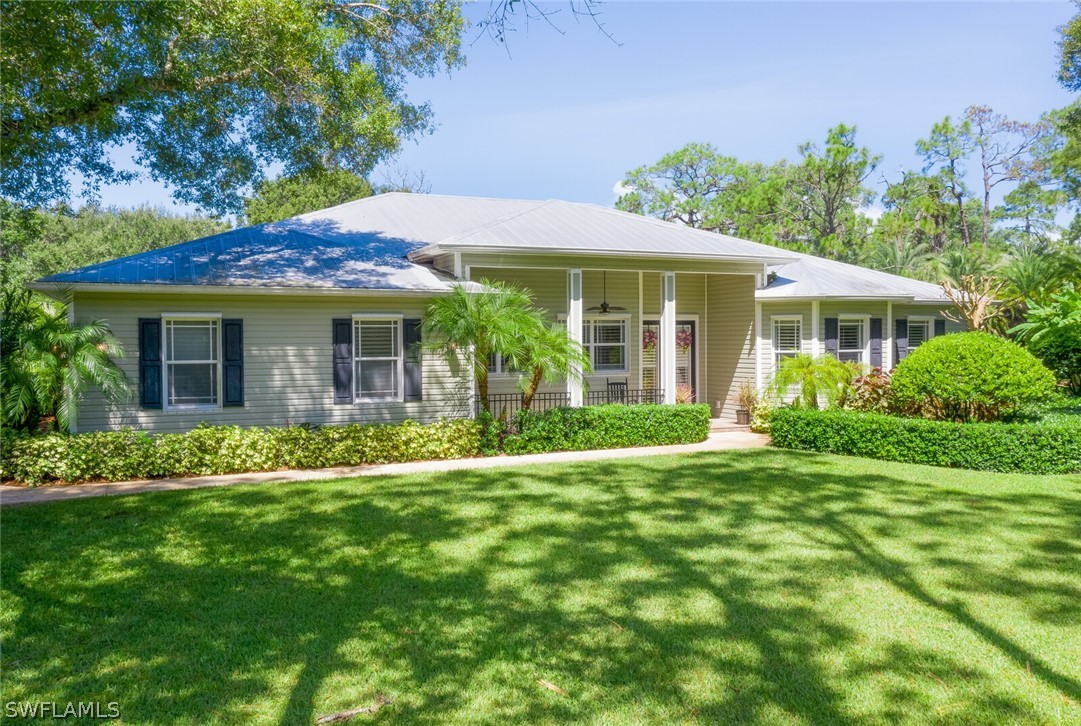 4030 Staley Road Fort Myers, FL 33905 - Photo 1 of 35 a front view of a house with a yard