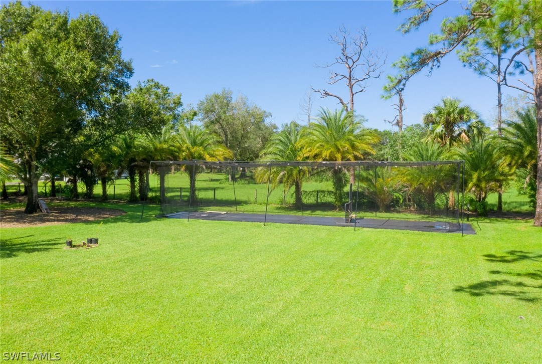 4030 Staley Road Fort Myers, FL 33905 - Photo 11 of 35 a view of a golf course with a garden