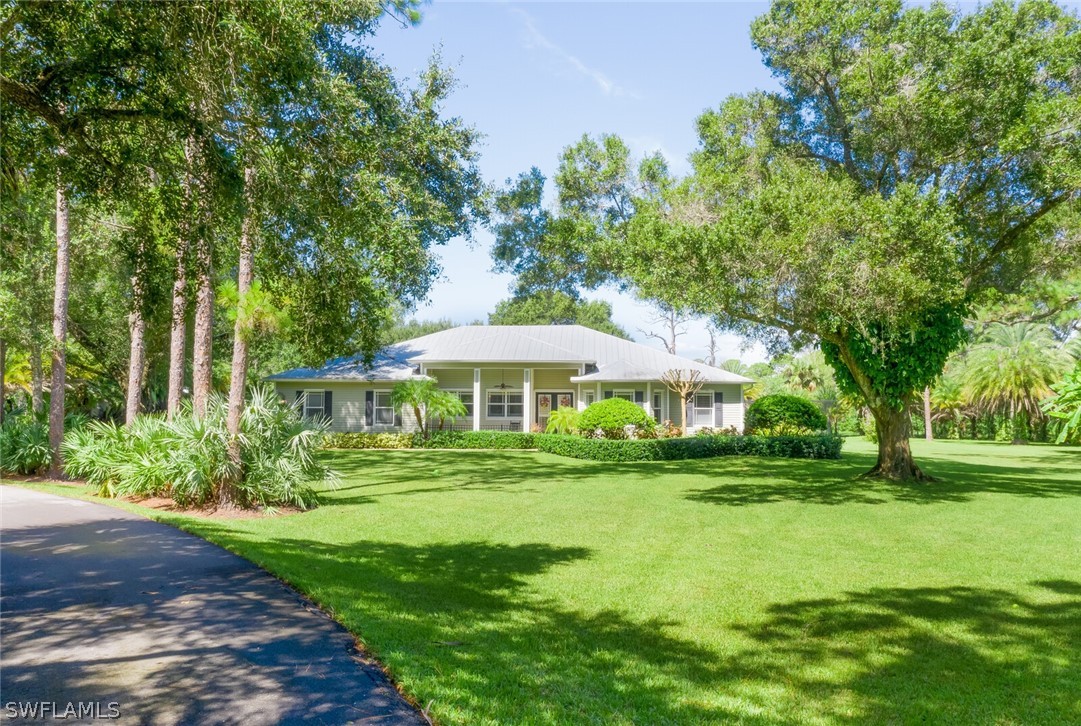 4030 Staley Road Fort Myers, FL 33905 - Photo 2 of 35 a view of a house with a yard