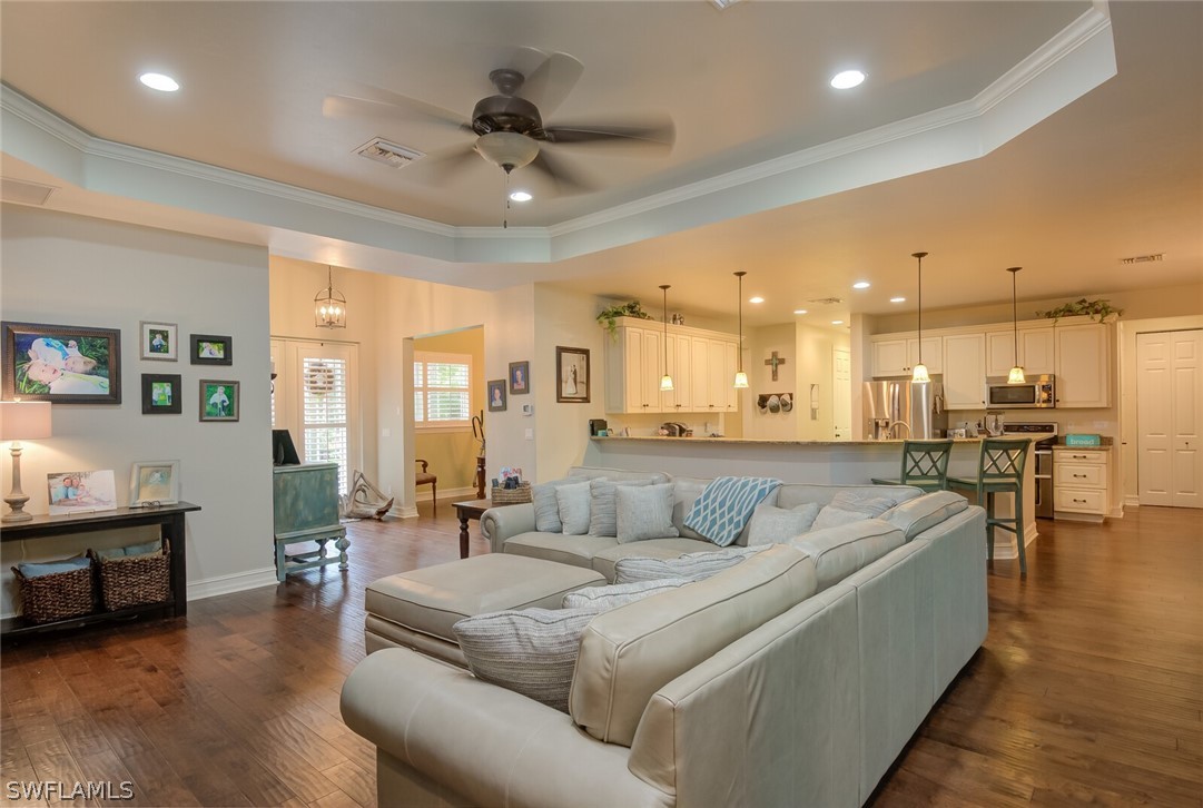 4030 Staley Road Fort Myers, FL 33905 - Photo 21 of 35 a living room with furniture and kitchen view