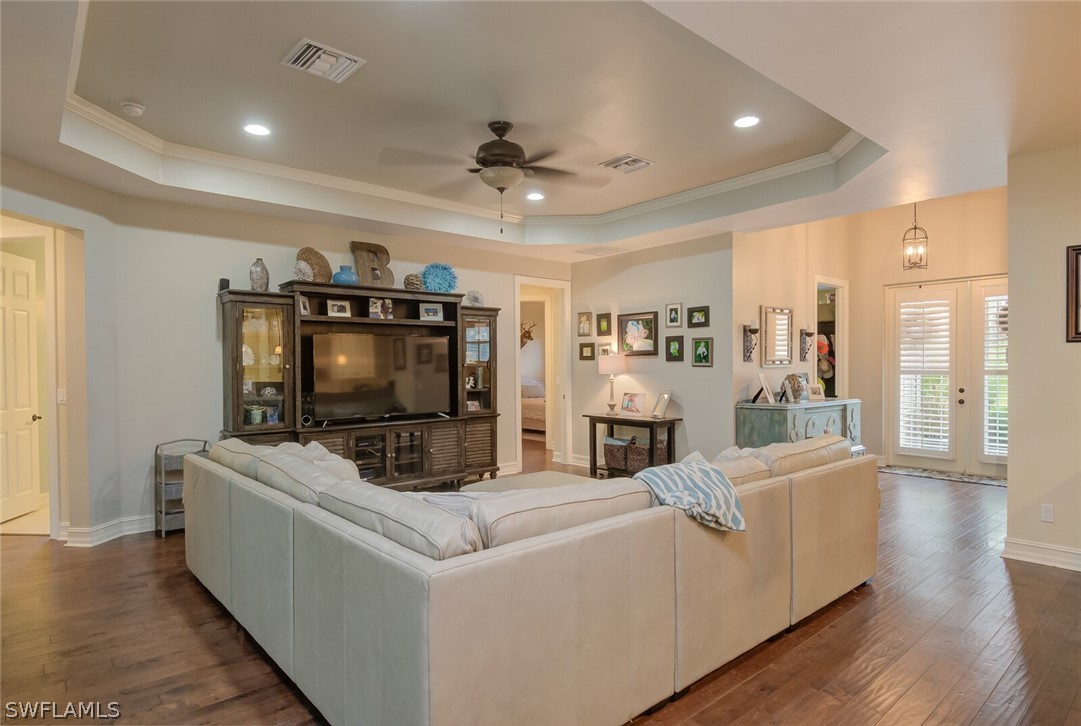 4030 Staley Road Fort Myers, FL 33905 - Photo 23 of 35 a living room with furniture and a flat screen tv