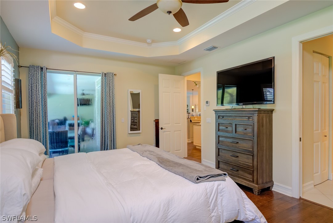4030 Staley Road Fort Myers, FL 33905 - Photo 25 of 35 a bedroom with a bed and a flat screen tv