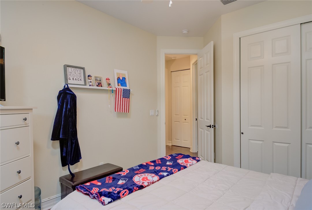 4030 Staley Road Fort Myers, FL 33905 - Photo 29 of 35 a bedroom with a bed and a dresser