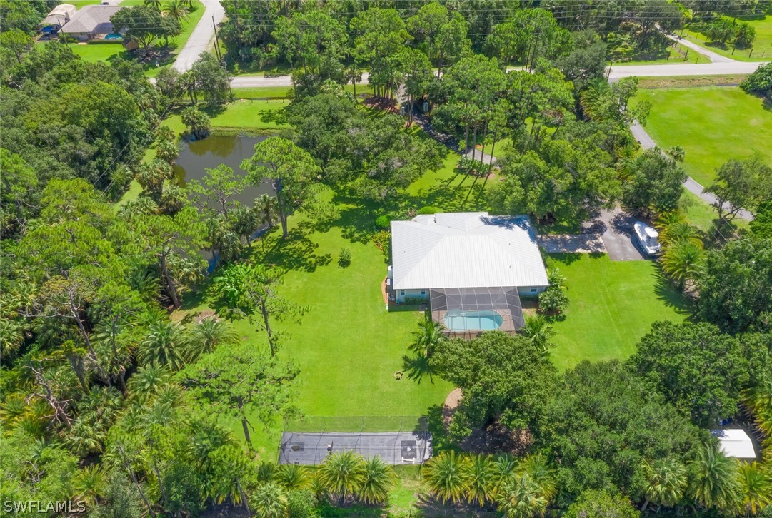 4030 Staley Road Fort Myers, FL 33905 - Photo 6 of 35 an aerial view of a house with pool outdoor seating and yard