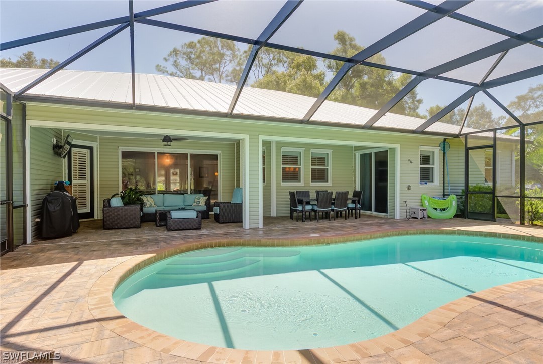 4030 Staley Road Fort Myers, FL 33905 - Photo 9 of 35 a view of a house with backyard porch and sitting area