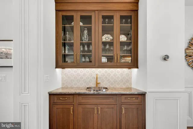 a spacious bedroom with a bed and a fireplace