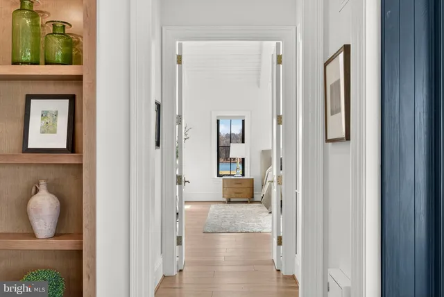 a living room with a couch and a rug