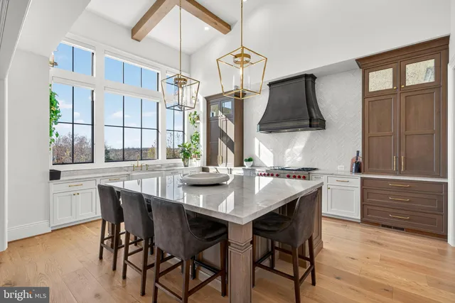 a bathroom with a shower and a sink