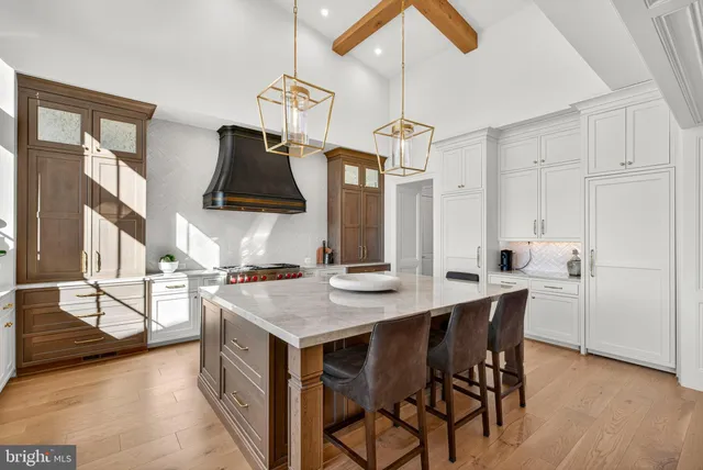 a bathroom with a sink vanity and a mirror
