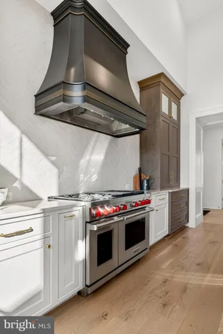 a view of a room with furniture and window