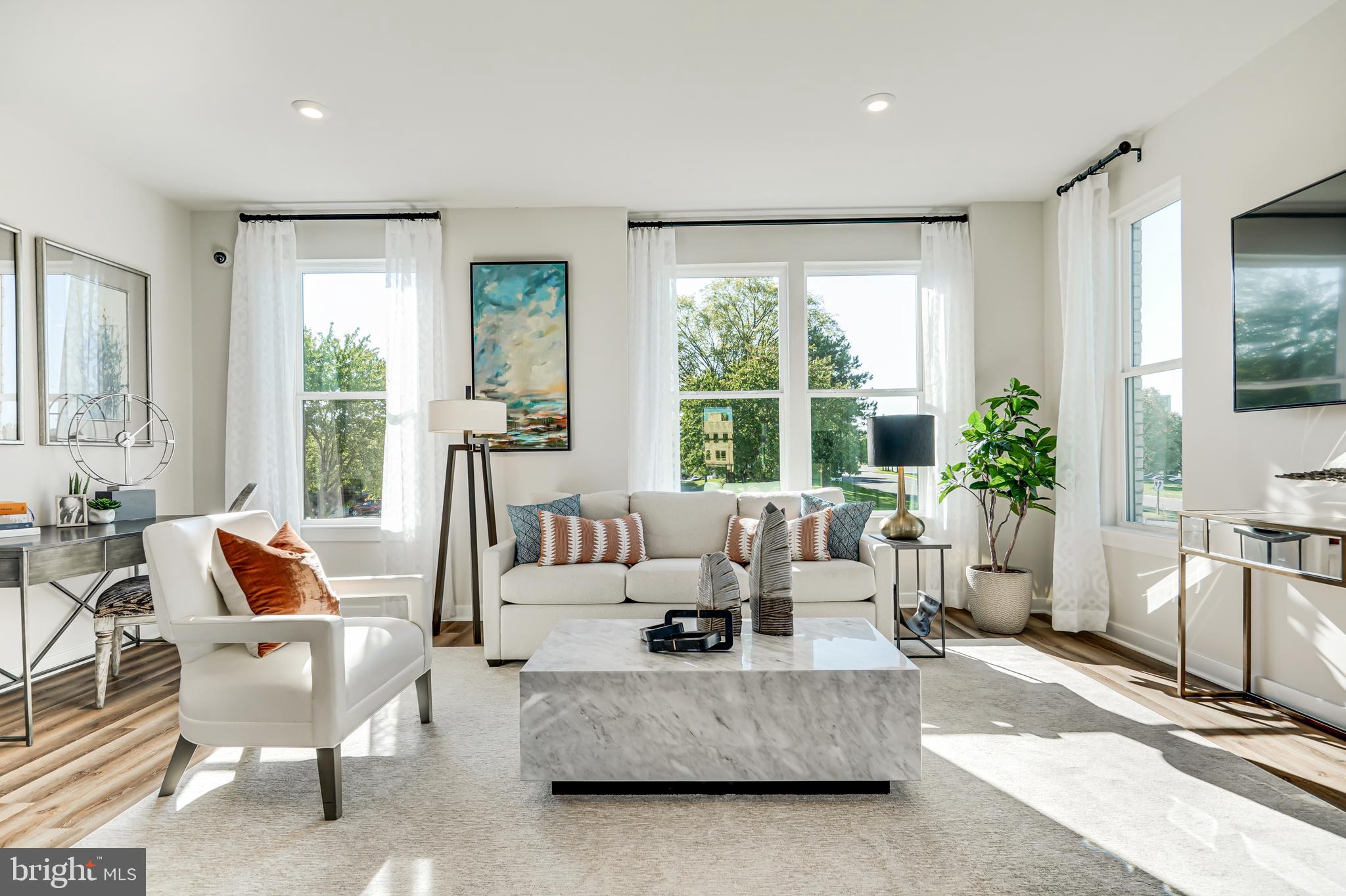 13658 Cobble Loop Woodbridge, VA 22193 - Photo 20 of 44 a living room with furniture and a large window
