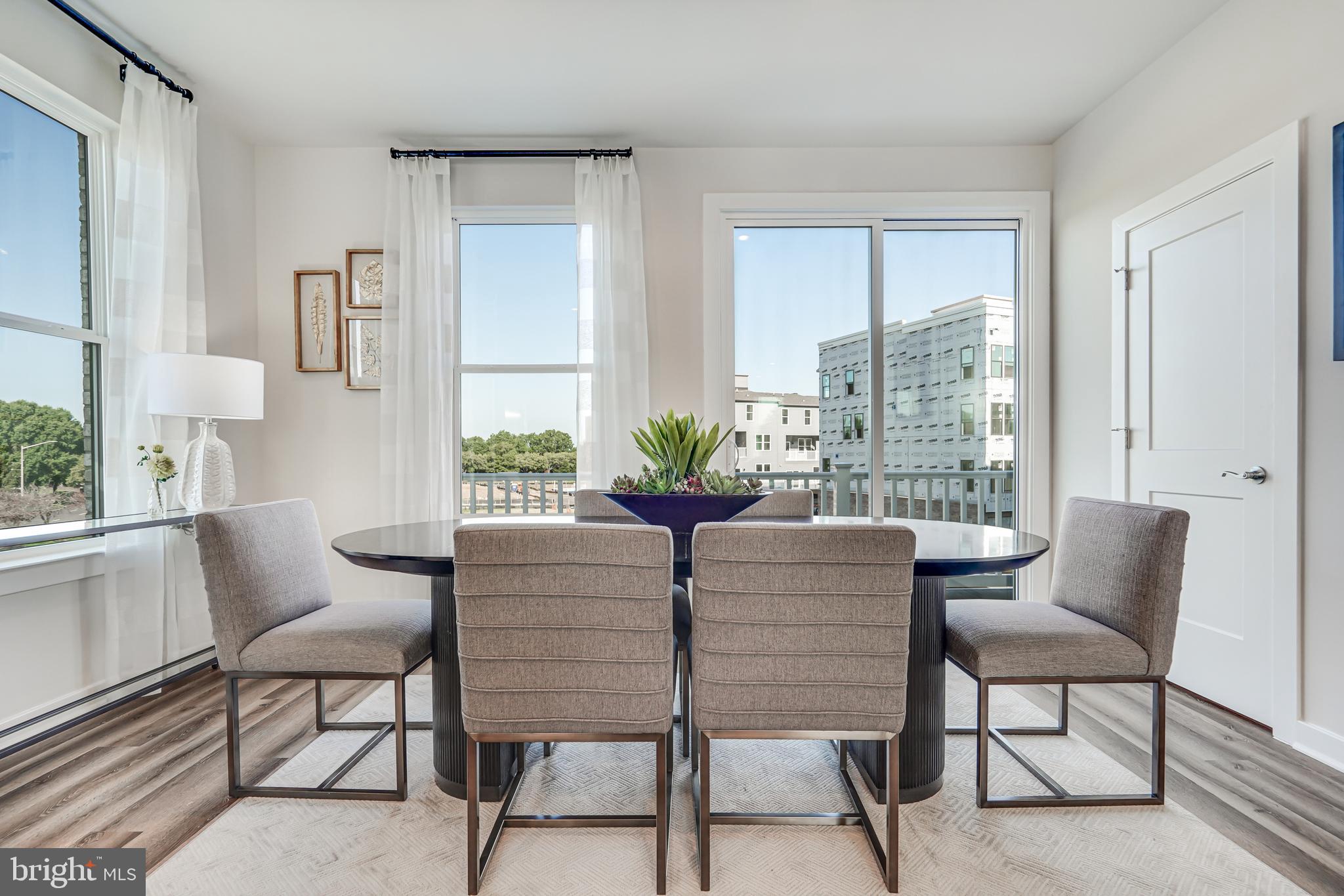 13658 Cobble Loop Woodbridge, VA 22193 - Photo 9 of 44 a dining room with furniture and wooden floor