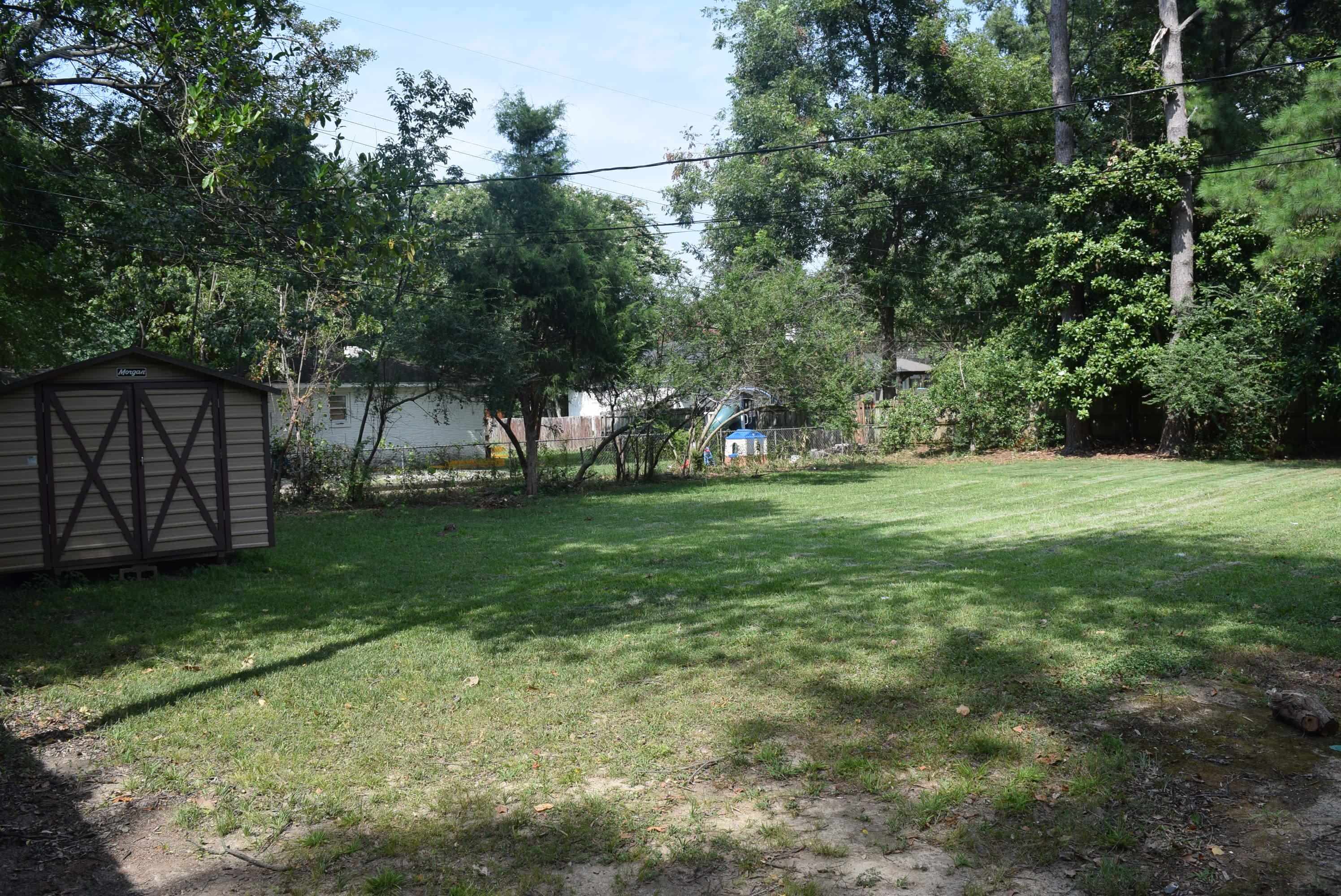 4144 Minden Road Memphis, TN 38117 - Photo 20 of 23 a view of a park with large trees