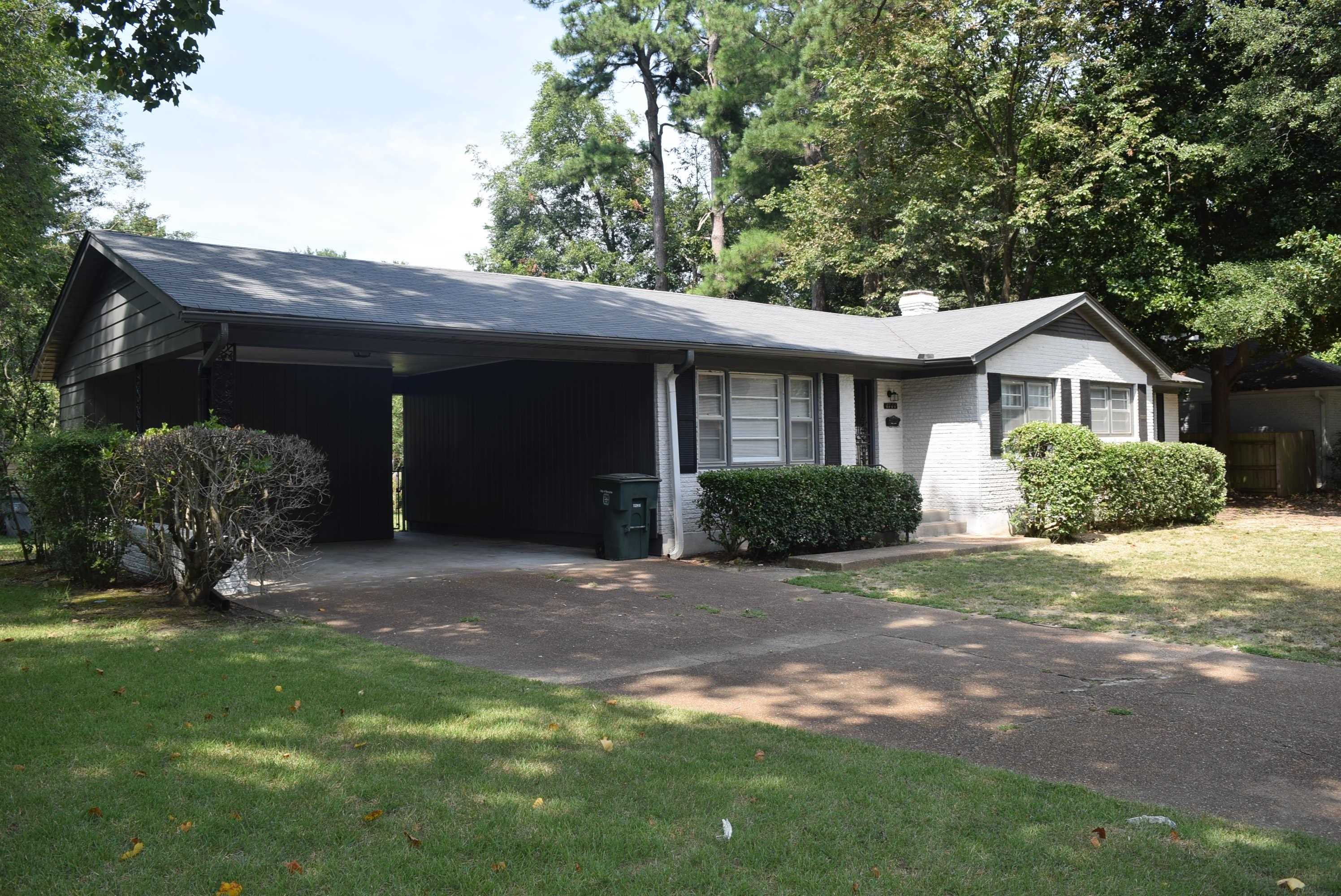4144 Minden Road Memphis, TN 38117 - Photo 2 of 23 a front view of a house with a garden