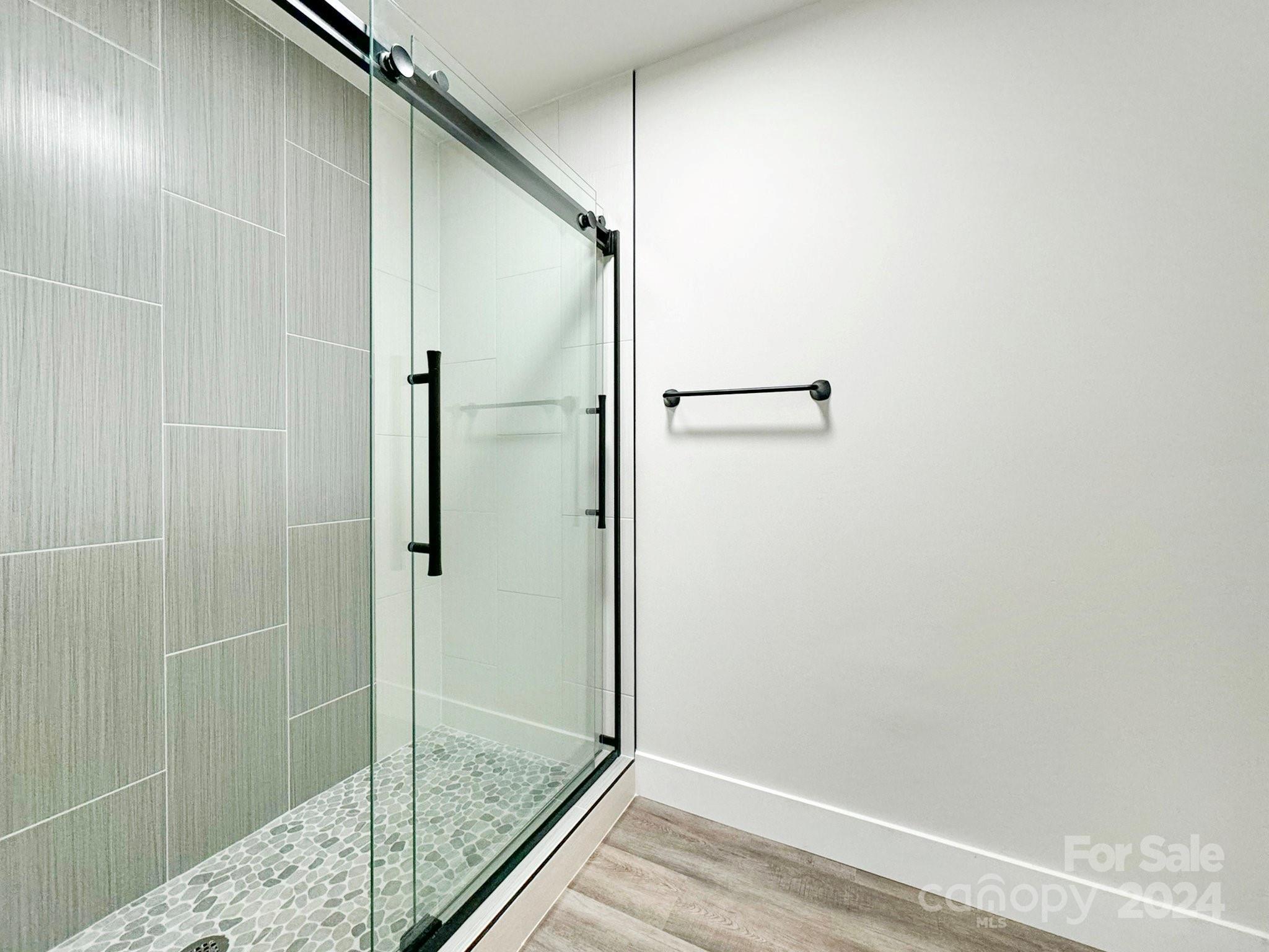 7802 Ridgeloch Place Charlotte, NC 28226 - Photo 17 of 31 a bathroom with a shower