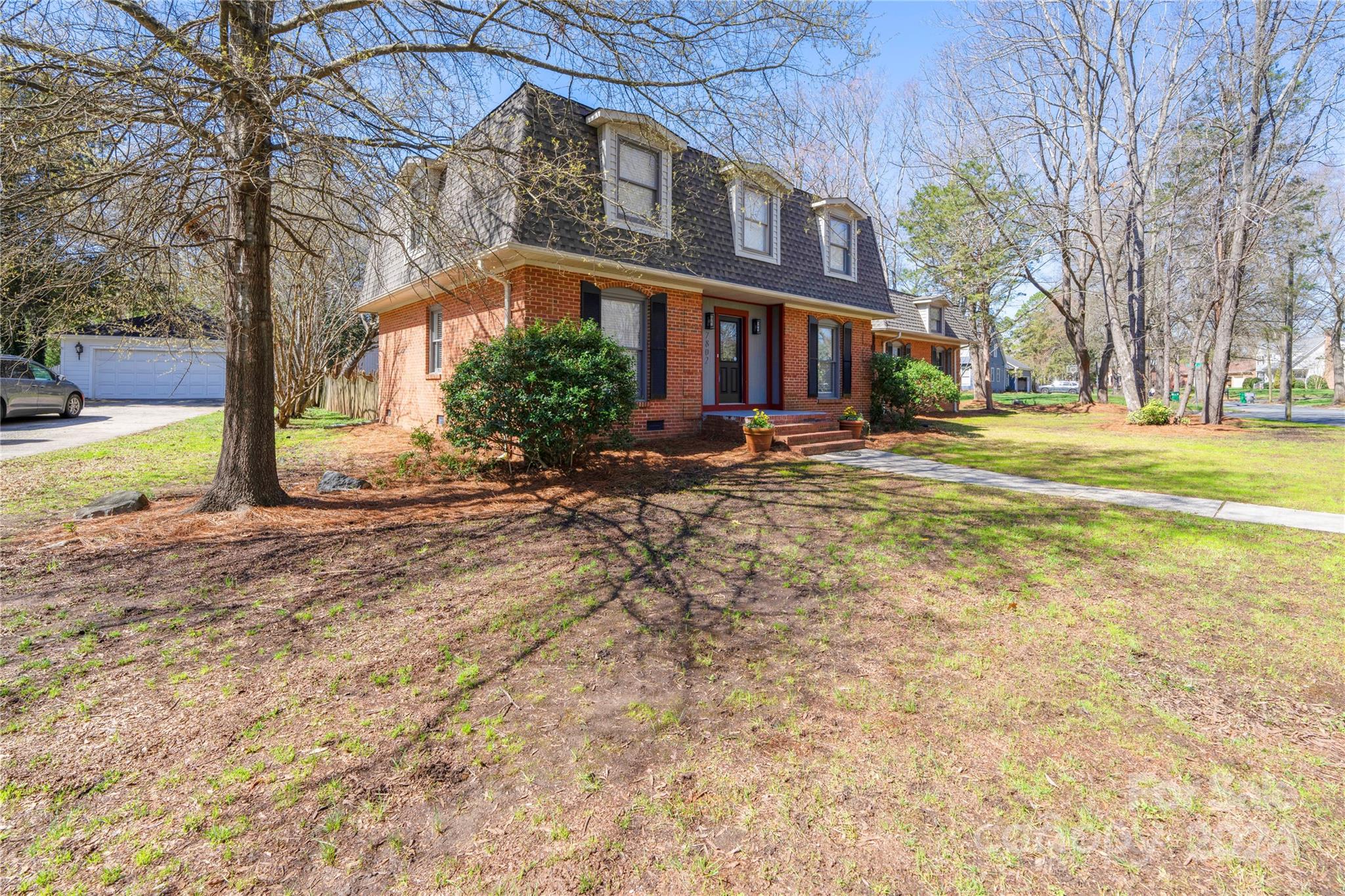 7802 Ridgeloch Place Charlotte, NC 28226 - Photo 24 of 31 a view of a building with a yard