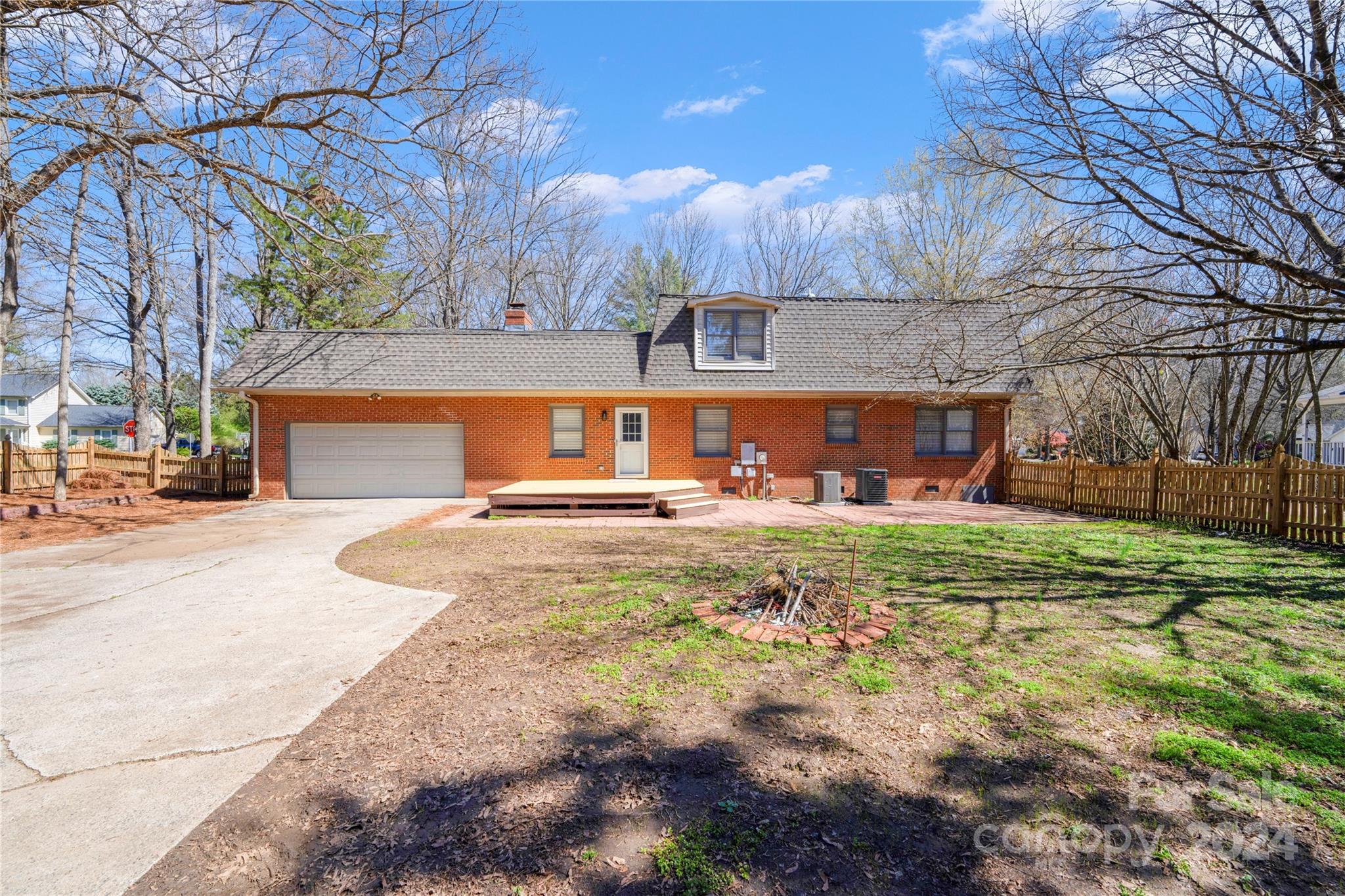 7802 Ridgeloch Place Charlotte, NC 28226 - Photo 26 of 31 a front view of a house with garden