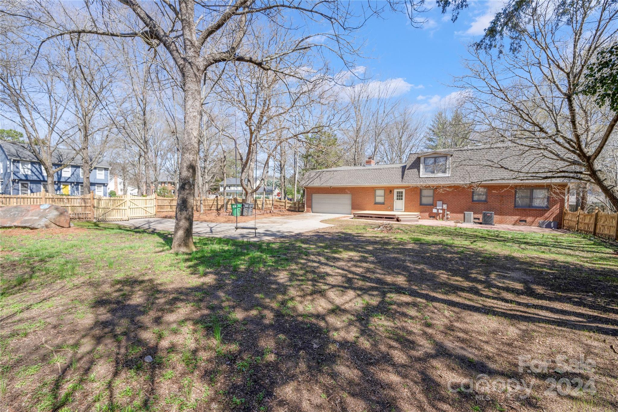 7802 Ridgeloch Place Charlotte, NC 28226 - Photo 27 of 31 a front view of a house with a yard