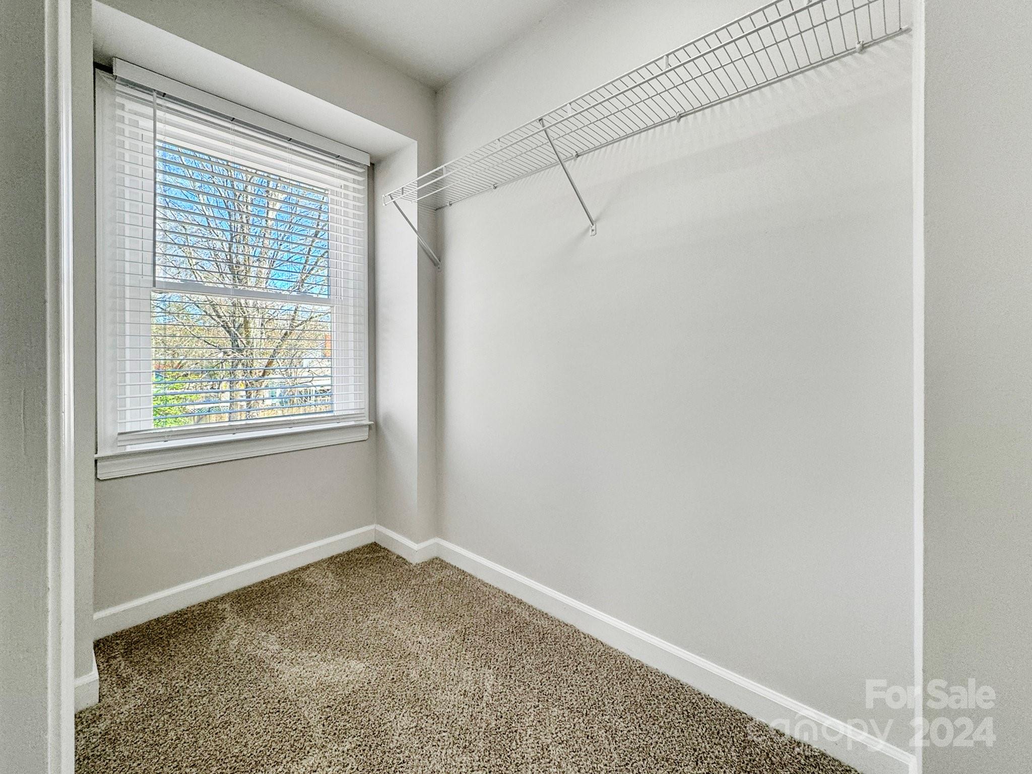7802 Ridgeloch Place Charlotte, NC 28226 - Photo 31 of 31 a view of a room that has a window in it