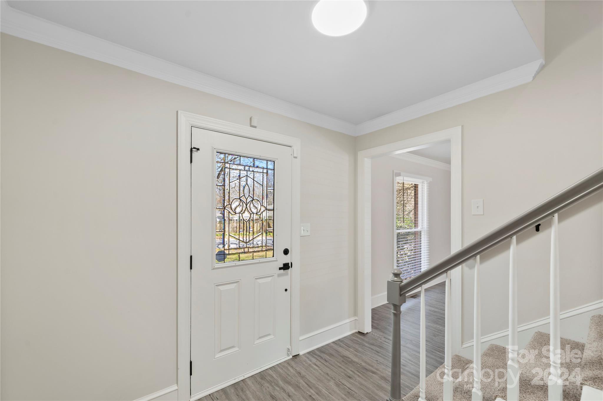 7802 Ridgeloch Place Charlotte, NC 28226 - Photo 5 of 31 a view of an entryway with wooden floor