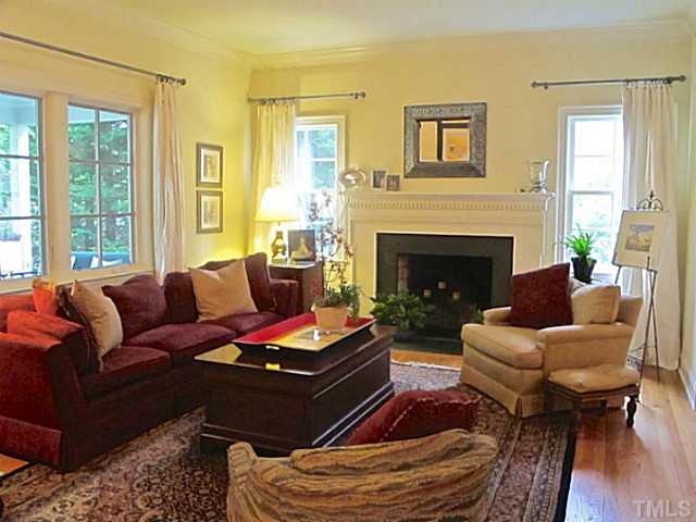 2532 Wake Drive Raleigh, NC 27608 - Photo 3 of 21 a living room with furniture fireplace and window