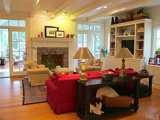 2532 Wake Drive Raleigh, NC 27608 - Photo 6 of 21 a living room with furniture and a fireplace